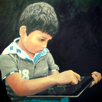 Child playing on iPad